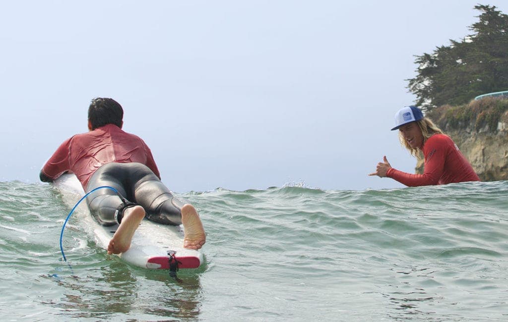 Student and Instructor surfing